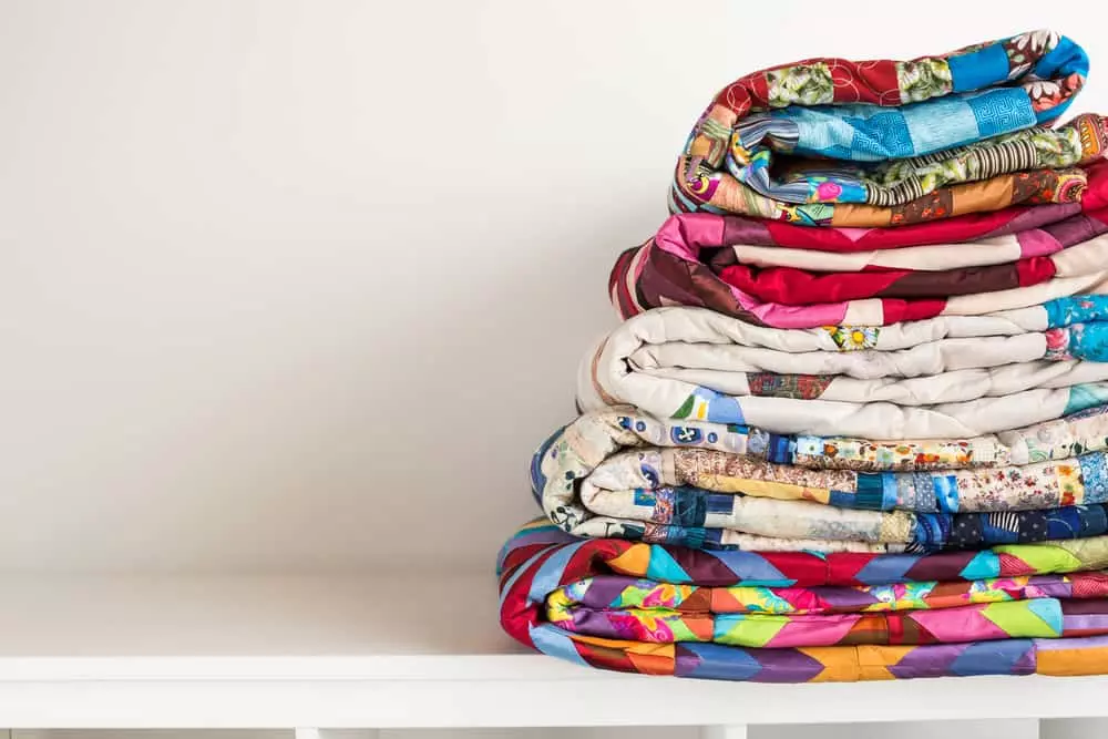 quilts folded in a pile