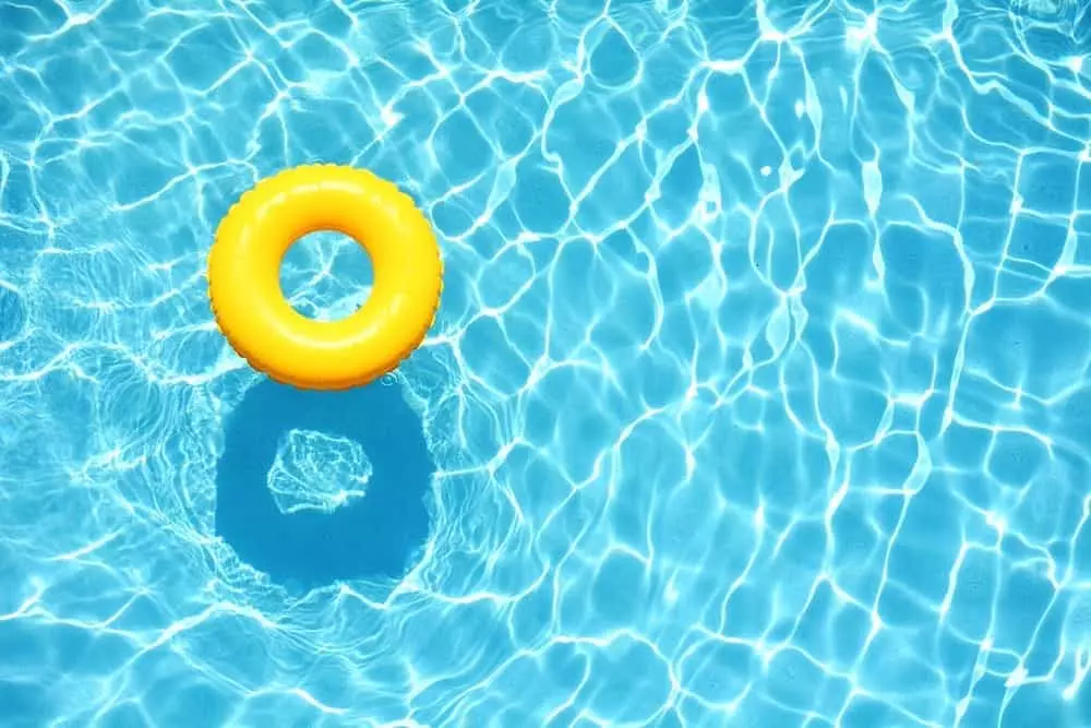 yellow tube floating in a pool