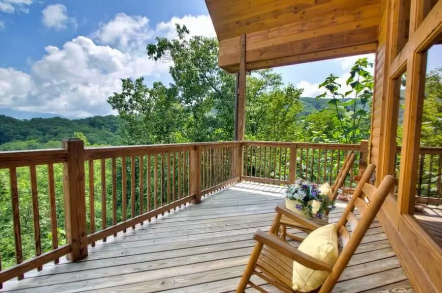 front porch on a cabin overlooking the mountains