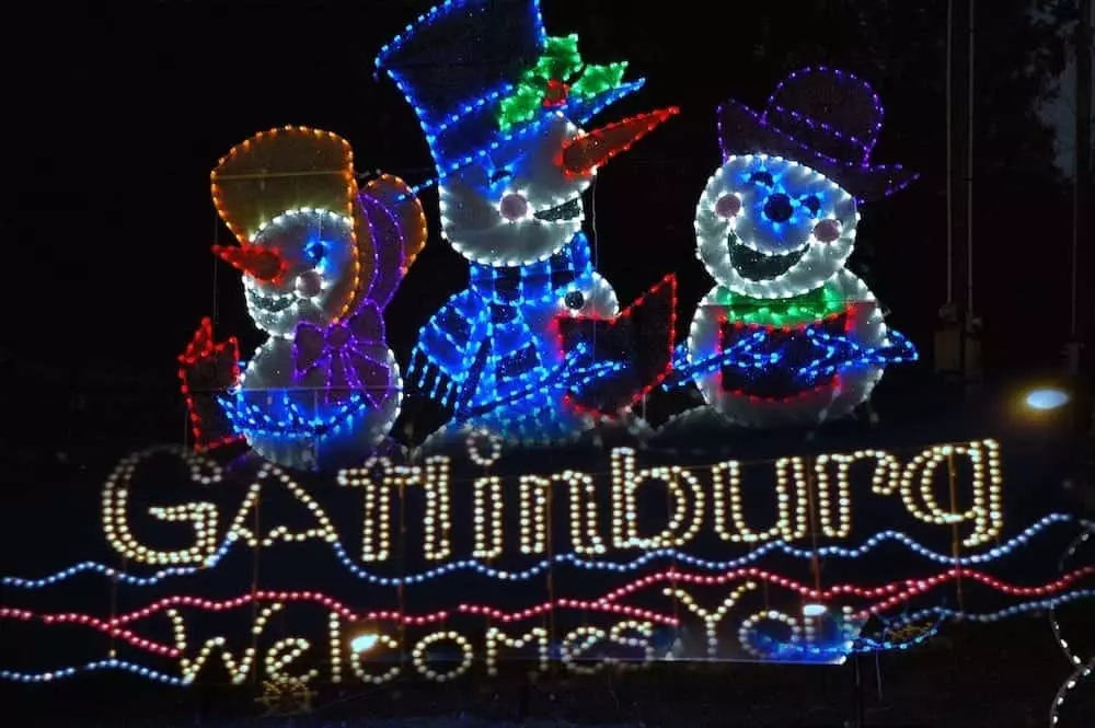 A Christmas lights display in Gatlinburg featuring happy snowmen.