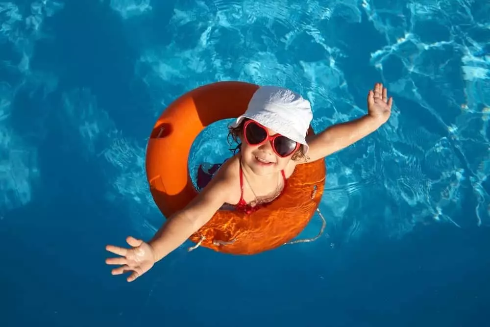 kid staying in a Pigeon Forge cabin with pool access