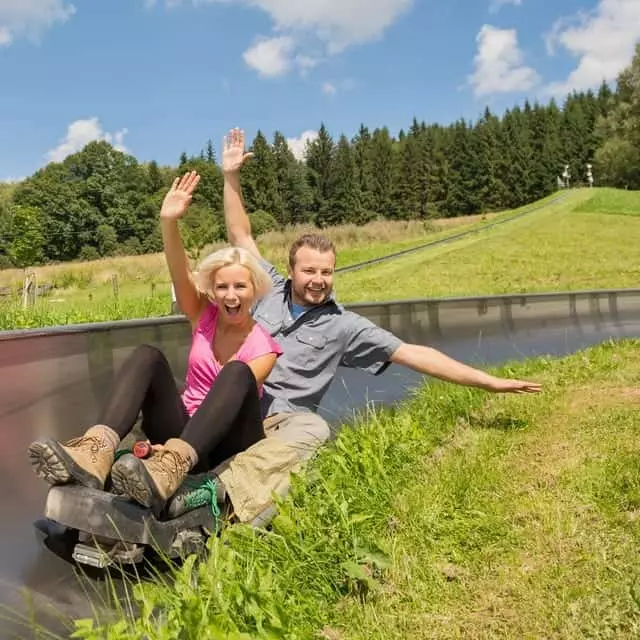 Couple riding Alpine roller coaster in Gatlinburg