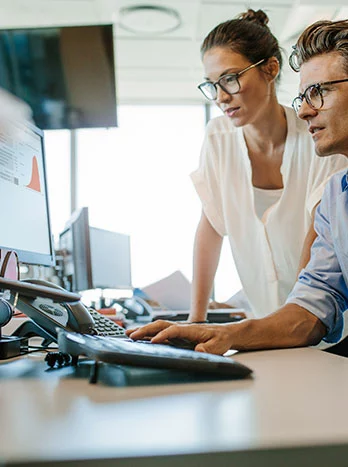 couple looking at computer