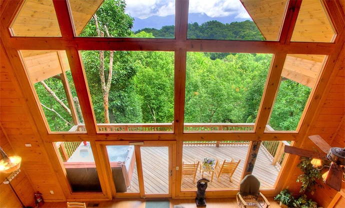 view of mountains and cabin deck