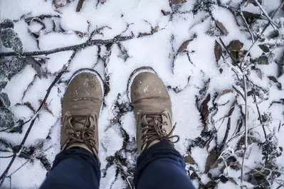 person on a winter hiking trail in the smoky mountains