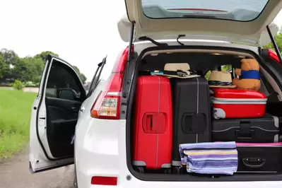 car packed with what to bring on a cabin vacation