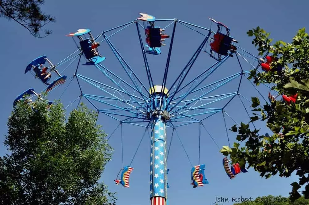 Guests riding flying chairs at Dollywood in Pigeon Forge, TN