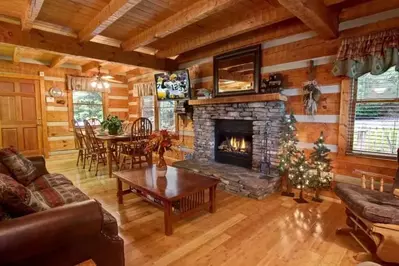 The living room with a fireplace at the Wildwood cabin in Sevier County.