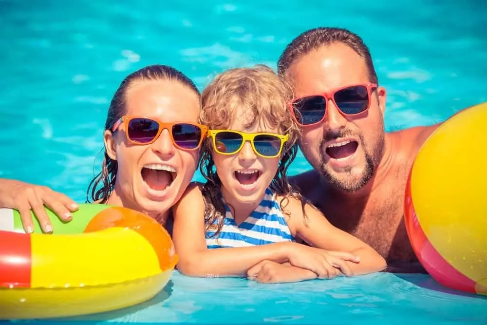 family swimming during Pigeon Forge family vacation