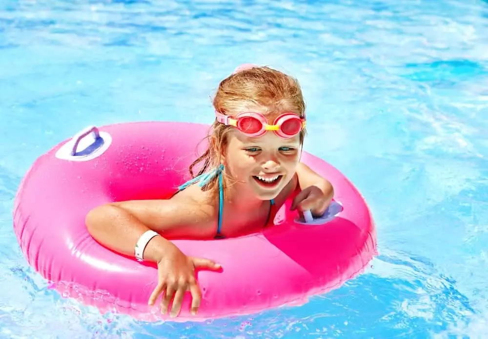 girl relaxing at a cabin in Pigeon Forge TN with pool