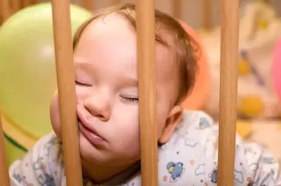 Baby napping in a Smoky Mountain luxury cabin rental.