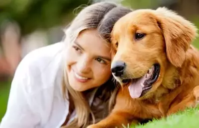 woman and dog on a pet friendly Gatlinburg cabin vacation