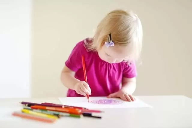 little girl crafting in a Gatlinburg cabin