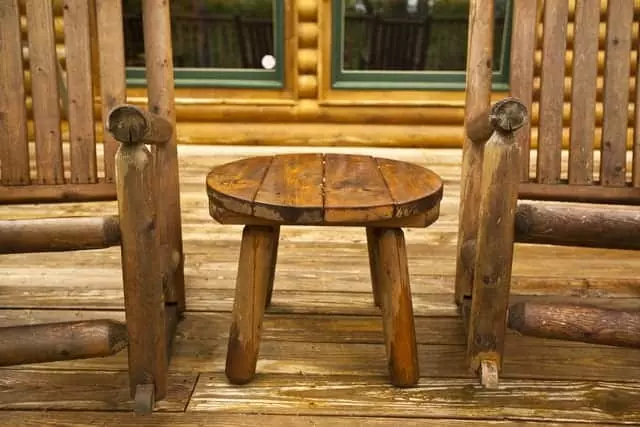 two rocking chairs on a cabin rental's back porch