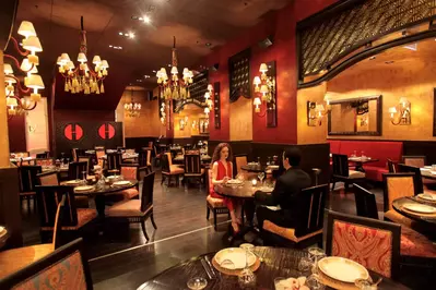 Inside restaurant with couple dining in the middle