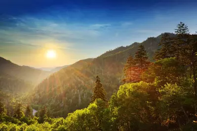 Gorgeous Smoky Mountain sunset from a secluded Gatlinburg cabin with a mountain view