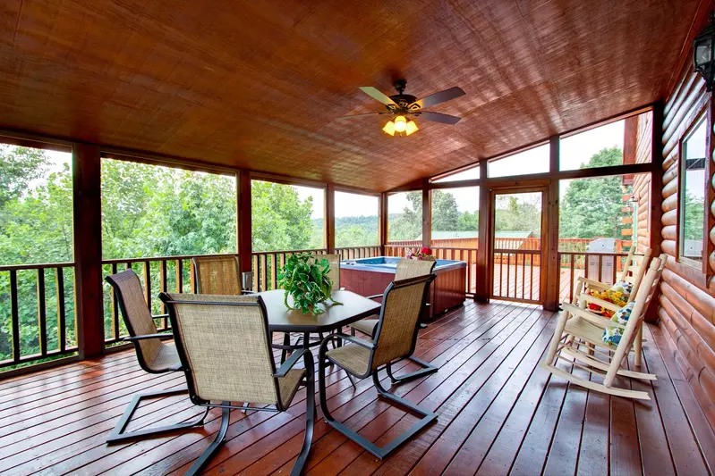 DINING ON SCREENED IN DECK