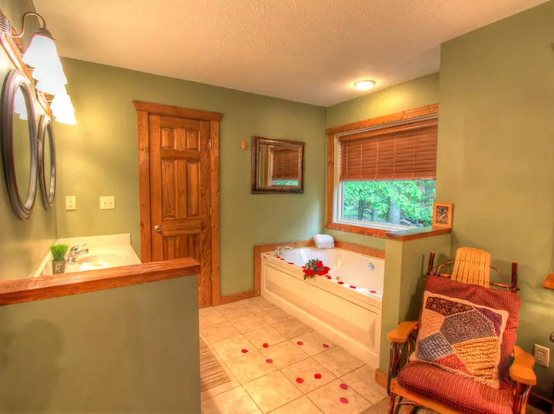 BATHROOM 1 W/ JACUZZI TUB