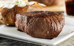 delicious-steak-with-loaded-baked-potato-at-Pigeon-Forge-restaurant-300x189[1]