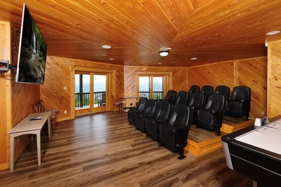 one top of the world is one of our gatlinburg cabins with home theaters